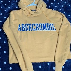 appear a little darker in person yellow hoodie